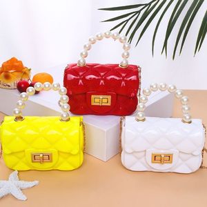 Bolsos de bebé Mini Pearl Jelly Bag Fashion Bolso lindo Pequeño PVC Bolsos de hombro de PVC Monedero Fábrica al por mayor