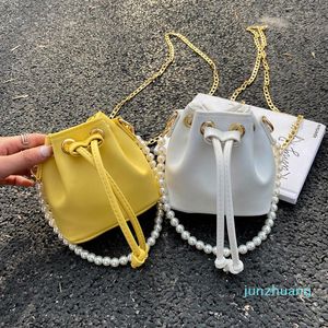 Bolsa de productos de diseñador 2022, diseño de moda, Mini cubo Simple, textura coreana de bolso de hombro de perlas para mujeres extranjeras 2022