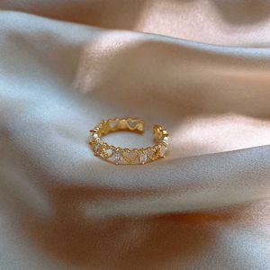 Anillos de banda 2020 Nuevo anillo de apertura en forma de corazón hueco de Corea del Sur Moda exquisita Anillo de dedo índice simple Joyería de banquete para mujer G230327