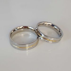 Band Rings Haute qualité occidental italien coréen 18 carats plaqué or en acier inoxydable bijoux anneaux de mariage Couple ensembles pour hommes et femmes AA230306
