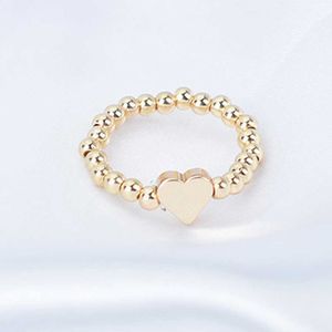 Anneaux de bande nouvelle couleur or coréen perle coeur anneaux pour les femmes à la main anneau élastique Simple réglable bijoux cadeau de fête de mariage