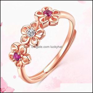 Anillos de banda Venta de accesorios Anillo de trébol Chapado en oro rosa Ciruela floreciente Europa y América Flor Mujer Entrega de gota Joyería Dhcvk