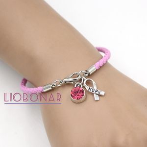 Brazalete 10PCS Venta al por mayor Pulsera de concientización sobre el cáncer de mama Joyería Pulseras con dijes de cinta de esperanza de cuero rosa para regalo de la Fundación contra el cáncer