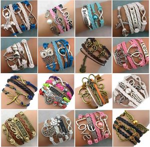 Brazalete al por mayor 30 unids/lote mezcla de estilos infinito amor pulseras con dijes pulseras de cuero multicapa antiguas para joyería de mujer