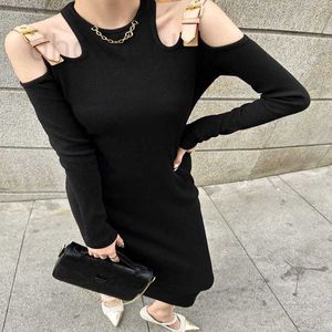 Vestidos casuales básicos Diseñador de mujer Hilo de punto de algodón Hombro Hueco Ain Decoración Moda Elegante Estilo de realeza Manga larga Slim C6R5