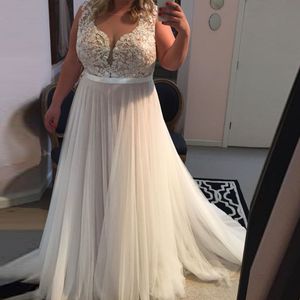 Hermosos vestidos de novia de encaje de una línea Vestidos de novia de tul baratos por encargo 2019 Escote en V transparente Ver a través de la espalda Tallas grandes vestidos largos