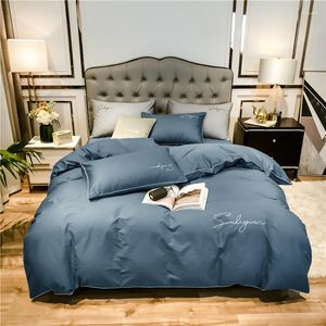 Conjuntos de ropa de cama 2023 de cuatro piezas de algodón simple doble hogar hoja de cama cubierta de edredón bordado sarga cómoda azul oscuro