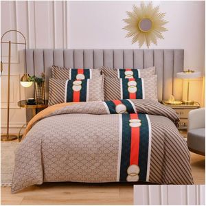 Conjuntos de ropa de cama 4 unids / set Edredón transpirable Er Sábana Funda de almohada Twin Queen King Tamaño Impresión saludable Familia Lujo Textiles para el hogar 230609 DH5JQ