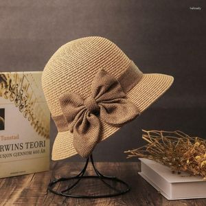 Bérets Sunshade Grass Woven Hat Women's Summer Coréen Version pêche pêcheur art littéraire Bow Top en gros pliable