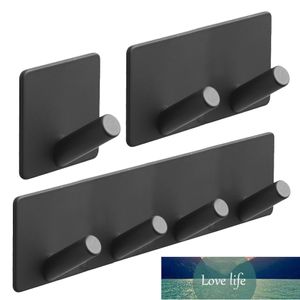 Ganchos de pared adhesivos negros Colgadores de pared sin taladros de servicio pesado para llaves de ropa Soporte de herramientas de baño de cocina Precio de fábrica diseño experto Calidad Último estilo