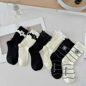Calcetines en blanco y negro calcetines de longitud media para mujeres calcetines de encaje de moda calcetines de princesa blancos