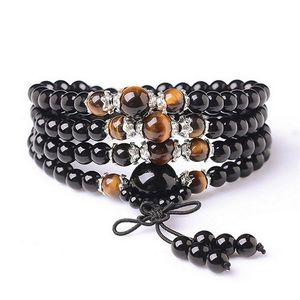 Color negro Ojo de tigre Cristal Tíbet Budista Buda Meditación 108 Grano de oración Mala Pulsera / Collar