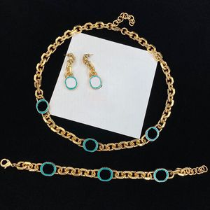 Collares de contraste de oro azul para mujer, colgante de anillo hueco, gota para el oído colgante corta con caja