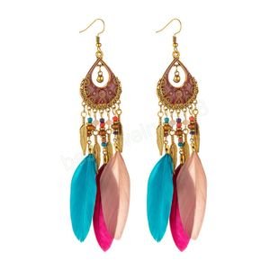 Bohème longue plume goutte boucles d'oreilles pour les femmes perlées à la main sculpté coeur boucles d'oreilles Boho Vintage indien bijoux