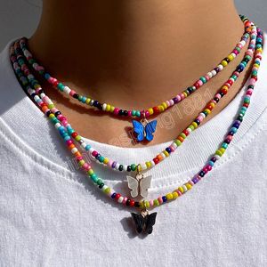 Collares bohemios con cuentas de semillas coloridas para mujer, collar con colgante de mariposa bonita, gargantilla hecha a mano bohemia, joyería al por mayor