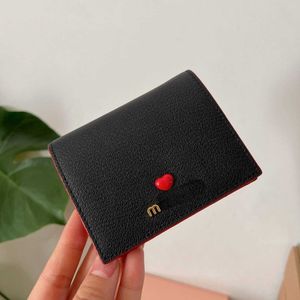 Diseñador de marca Cambio Monedero Monedero Bolso Soporte Devolución e intercambio Miaos Cuero de vaca genuino Sweet Love Girl Carteras cortas de cuero Venta directa de fábrica