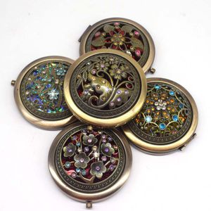 Espejo de bolsillo portátil de Metal con diamantes y flores de Color bronce, Mini espejo de maquillaje plegable de dos lados, espejos cosméticos de mariposa Vintage