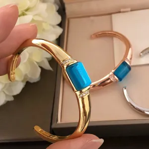 BUIGARI Brazalete de cerámica blanca Brazalete de diseño de cristal azul para mujer Cristal de diamante Chapado en oro de 18 quilates Mostrador de la más alta calidad Estilo clásico Regalo de aniversario 017