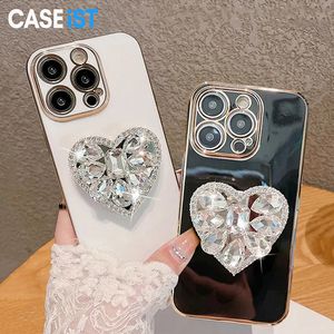 CASEiST Coque de téléphone galvanisée de luxe avec support en diamant en forme de cœur, support en strass 3D, cadeau pour femme, coque en TPU scintillante pour iPhone 15 14 13 12 11 Pro Max XS 8 7 Plus