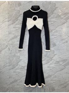 Robes décontractées haute qualité robe pull 2023 automne hiver femmes col roulé nœud déco à manches longues noir rouge tricoté