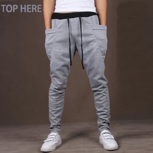 Casual Hommes Pantalons Unique Big Pocket Hip Hop Hop Harem Pants Qualitwear Pantalon de survêtement Outwear Casual Mens Joggers Top ici Pantalon pour hommes C18111201