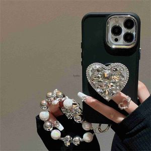 Étuis de téléphone portable coréen simple luxe givré diamant support en forme de coeur arc perle bracelet chaîne étui iPhone 11 12 13 14 15 Pro Max couverture souple H240326