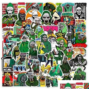 Pegatinas de pieles de teléfono celular 50 unids Hip Hop Rapero MF Doom Cantante Iti DIY Skateboard Lage Laptop Guitarra Juguetes Calcomanías para Fan Kids Drop Dhb3A