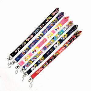 Sangles de téléphone portable Charms 100pcs Japon Anime Sailor Moon Lanyard Neck Strap Clip Bande noire pour clé de voiture Carte d'identité Porte-badge de téléphone portable 2022 Vente en gros