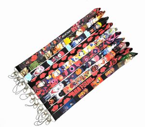 Sangles de téléphone portable Charms 100pcs Japon Anime garçon amour dessin animé Longe Cou Sangle Clip Bande Noire pour Clé De Voiture ID Carte Téléphone Mobile Porte-Badge 2022 En Gros