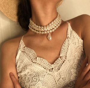 Chaînes mode multicouche blanc Imitation perle tour de cou avec fixation de tranche de métal large bavoir collier bijoux pour femmes de charme