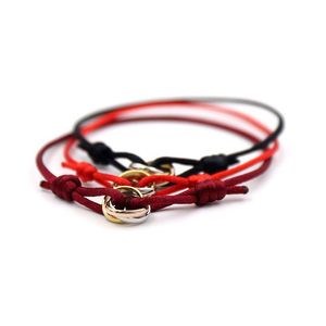 Charm Bracelets Bracelet Luxury Trinity Ring String Tres anillos Correa de mano Pareja para mujeres y hombres Joyería de acero inoxidable Famoso R Dhffv