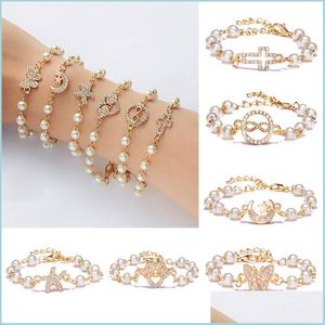 Bracelets De Charme Mode Cristal Strass Infinity Bracelets Étoile Étoile De Mer Croix Papillon Ange Ailes Charme Imitation Perle Perles B Dh6U3