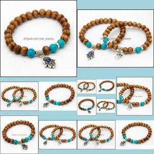 Bracelets porte-bonheur Produits Qualité de gros 8Mm Perles en bois perlé Fatima Main Hamsa Bracelets Om Yoga Bijoux Drop Delivery Dhxif