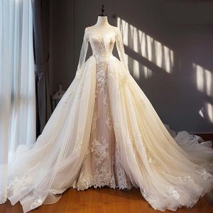 Robes de mariée beiges de charme Appliques en dentelle Sheer Neck Manches longues Robes de mariée Tulle Overskirts Corset Back Sweep Train Robe de mariée