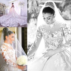 Encantadores mini-cuello alto Vestidos de novia de Dubai Con cuentas Apliques florales Mangas largas Vestidos de novia de organza Glamoroso Capilla Tren Vestido de novia