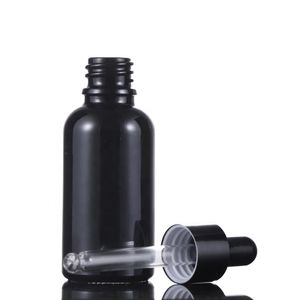 Precio barato 10 ml 15 ml 20ml 30ml 50ml 100ml botellas de vidrio negro botellas de aceite vacío con tapa negra en venta
