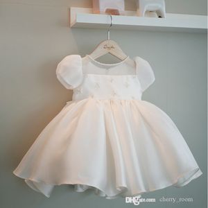 Niños vestidos de princesa de perlas blancas niña volante vestido de tutú de manga corta elegante dulce bebé de un año de gasa ropa de niño de flores S1901