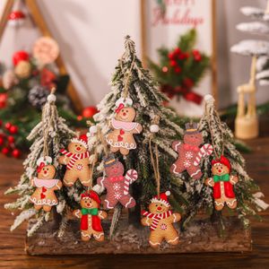 Decoraciones navideñas dibujos animados cuatro palacio rejilla 12 Uds hombre de jengibre de madera pareja muñeca colgante árbol de Navidad colgante