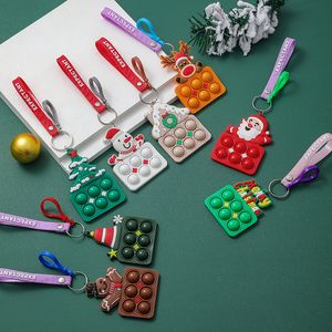 LLavero de serie temática navideña de goma suave con dibujos de Papá Noel, alce, muñeco de nieve, regalos de Navidad, bolsa, accesorios colgantes