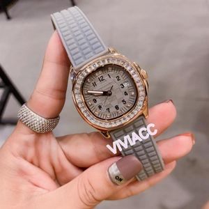 Relojes clásicos Nautilus con diamantes de hielo y cristal para mujer, reloj de goma multicolor, vestido de señora, reloj de cuarzo con esfera tallada en mosaico 36mm242r