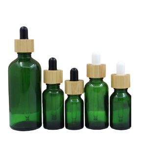 Botella cuentagotas de vidrio verde transparente Tapa de madera de bambú 5ml 10ml 15ml 20ml 30ml 50ml 100ml Envase cosmético Envase recargable Viales de aceite esencial vacíos