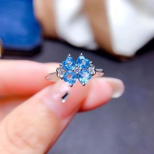 Anillos de racimo, joyería de diseño Foydjew, venta al por mayor, trébol de cuatro hojas de lujo, anillo abierto ajustable de topacio simulado azul suizo para mujer