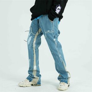 Bloc de couleur peint Streetwear cordon jean hommes effiloché côté ruban lâche décontracté Denim pantalon Hip Hop Harajuku Couple pantalon 220720