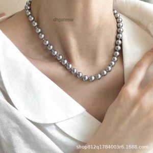 Colorido plateado plateado gris shi jia zhengyuan fuerte collar de perlas de luz luz de lujo
