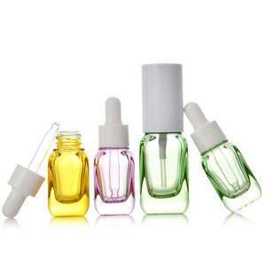 Botella de perfume de aceite esencial de vidrio vacío colorido Envases cosméticos de tamaño de viaje al por mayor con rociador / gotero de pipeta / bomba de loción 10ml 20ml 40ml