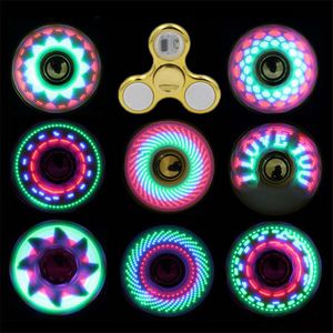 Coolest coolest led light change fidget spinners juguete para niños juguetes patrón de cambio automático 18 estilos con arco iris light up hand spinner