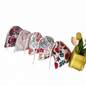 Cott Linen Almacenamiento de almacenamiento floral Bolsa para mujeres Mujer bolsa de almacenamiento de acabado Bolsa de maquillaje lindo Regalos de Navidad Organizador de joyas de dulces G1xg#