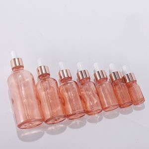 Botella de aceite esencial vacía personalizada 5 ml 10 ml 15 ml 20 ml 30 ml 50 ml 100 ml botellas cuentagotas de vidrio de oro rosa al por mayor de fábrica