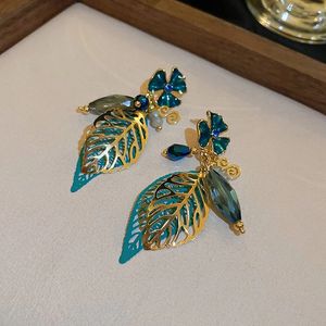 Boucles d'oreilles lustre en diamant avec feuilles de cristal, boucles d'oreilles design bohème à la mode