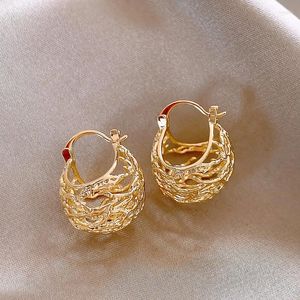 Boucles d'oreilles pendantes pour femmes, sens Unique du Design, ajouré en forme de nid d'oiseau, couleur or, bijoux, accessoires inhabituels, 2024